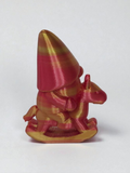 Gnome on rocking horse